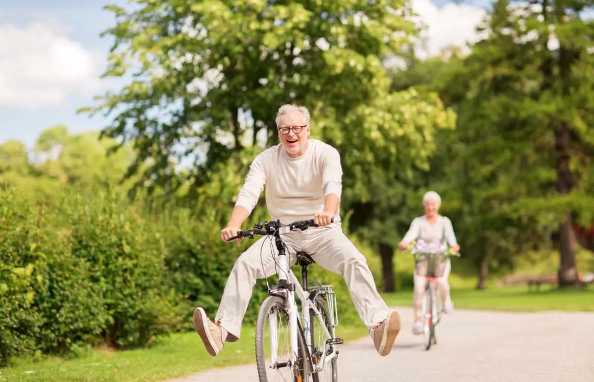an image of older adults riding on their bikes