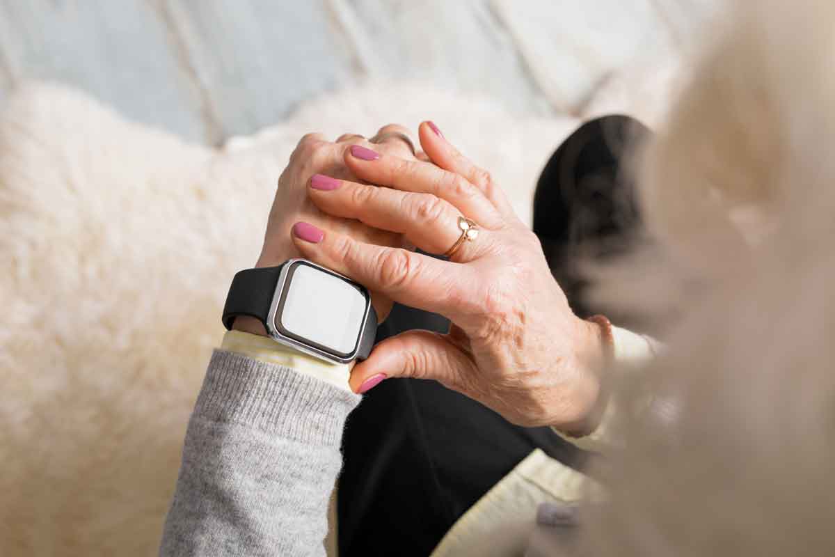 image of an elderly person with a smartwatch